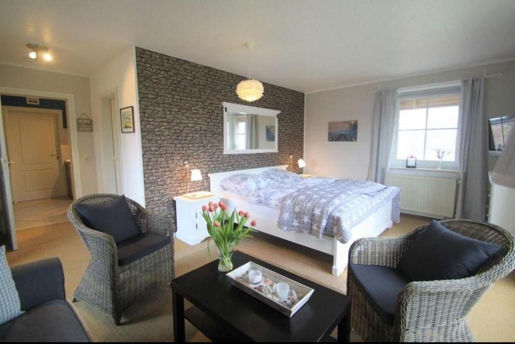 Ένα ή περισσότερα κρεβάτια σε δωμάτιο στο Erholung und Wellness