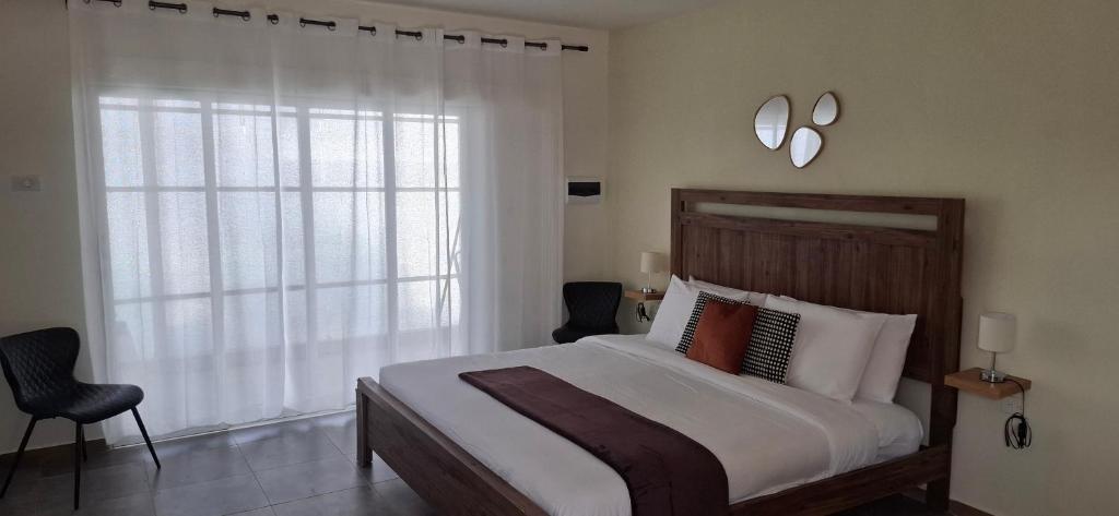 Postel nebo postele na pokoji v ubytování Deluxe Studio