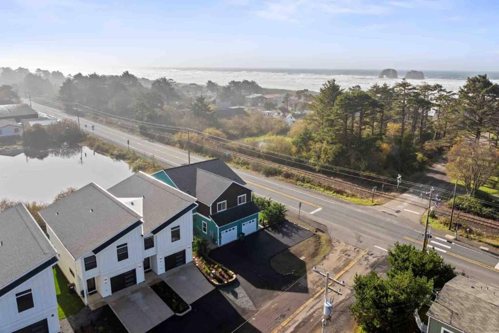 an aerial view of a house with a street and a road at Lake & Laughter Unit 1 in Rockaway Beach