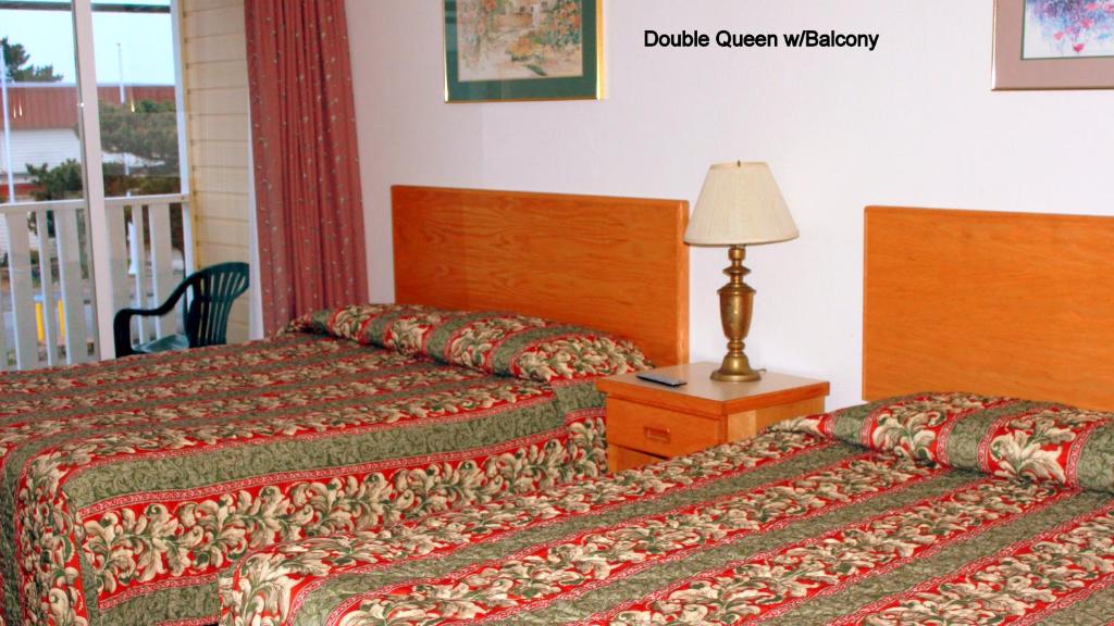 Postel nebo postele na pokoji v ubytování Motel 101