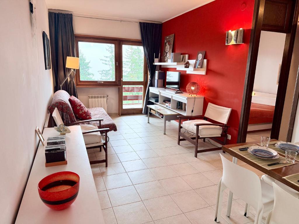 Posezení v ubytování Baita Arancio By DomusExtra