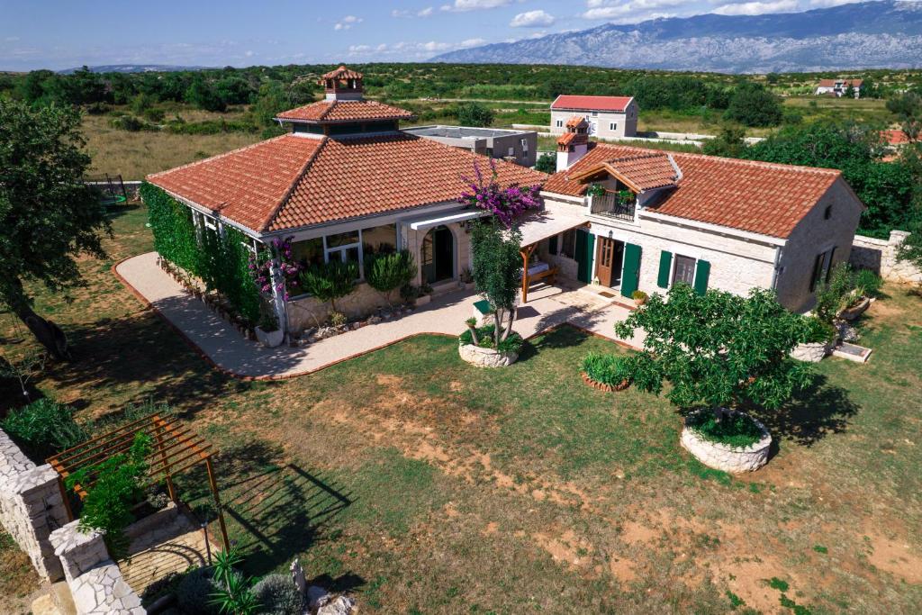 an overhead view of a house with a roof at Villa Vidonjica in Novalja
