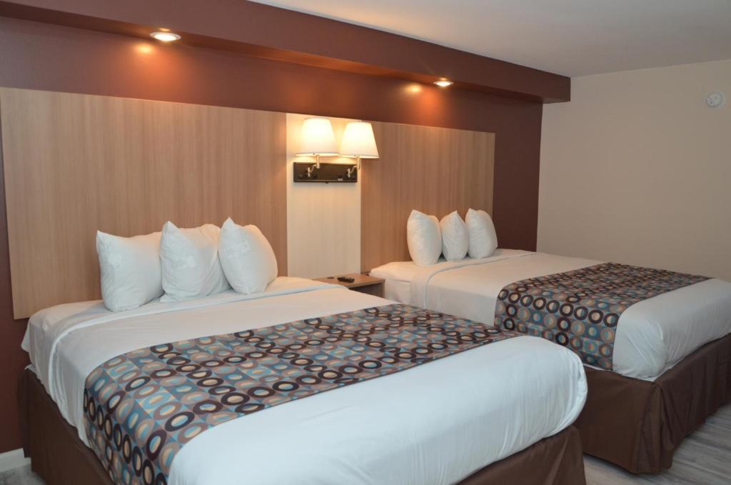 Postel nebo postele na pokoji v ubytování Seahorse Inn