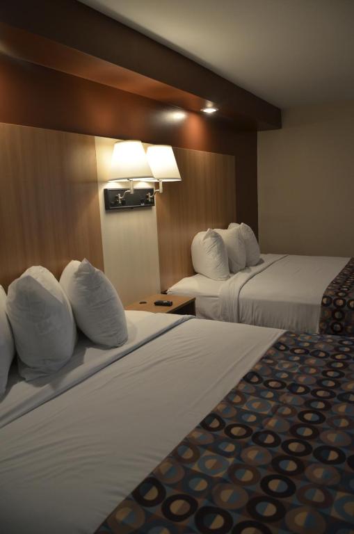 Postel nebo postele na pokoji v ubytování Seahorse Inn
