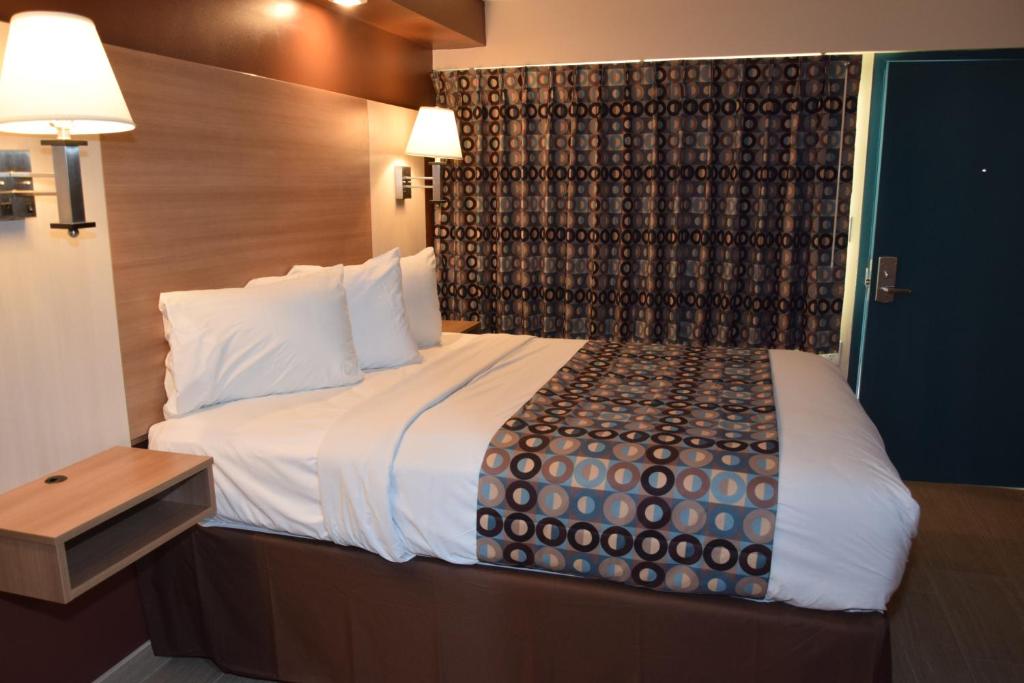 Postel nebo postele na pokoji v ubytování Seahorse Inn