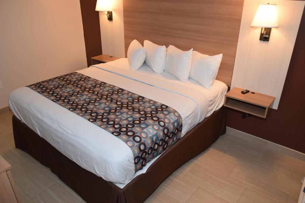 Postel nebo postele na pokoji v ubytování Seahorse Inn