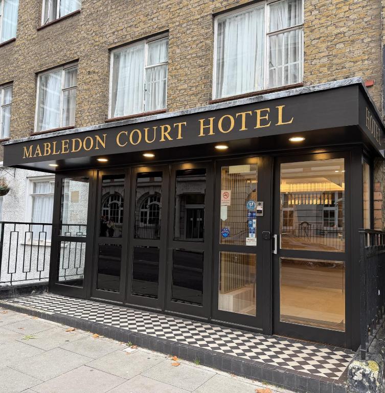 a store front of a marilyn court hotel at Mabledon Court Hotel in London