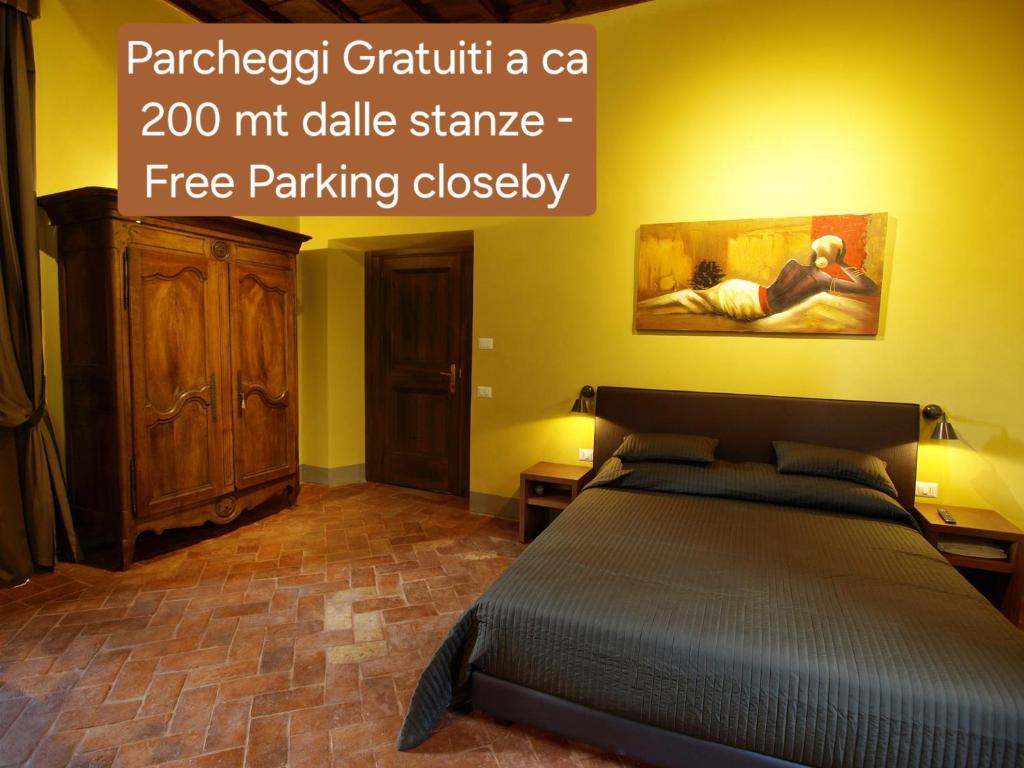 Postel nebo postele na pokoji v ubytování Le Stanze Del Duomo