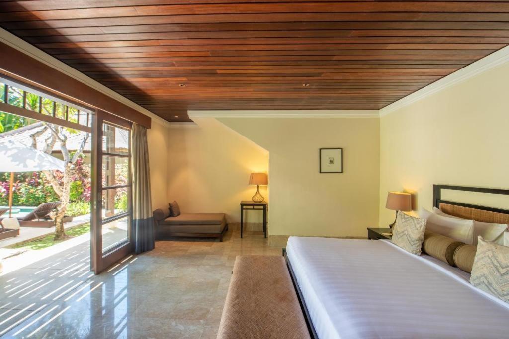 Postel nebo postele na pokoji v ubytování Karma Kandhara