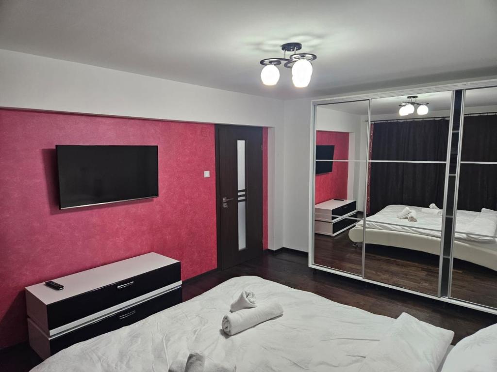 Ένα ή περισσότερα κρεβάτια σε δωμάτιο στο Brianna Apartament