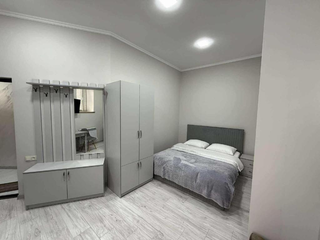 Postel nebo postele na pokoji v ubytování Bank Hotel