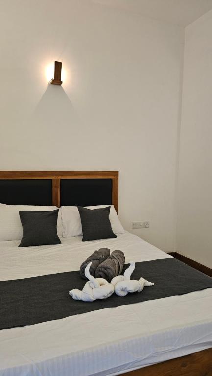 Ένα ή περισσότερα κρεβάτια σε δωμάτιο στο nelli house