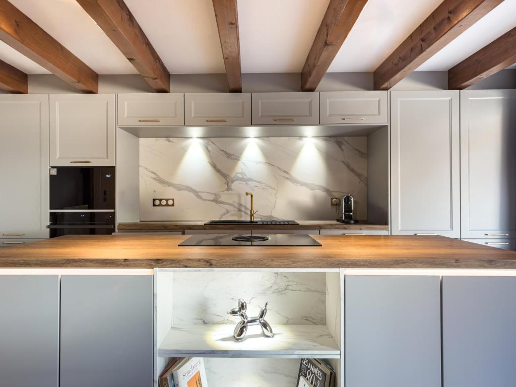 Η κουζίνα ή μικρή κουζίνα στο Résidence 90 m2 lumineuse - cour intérieure alsacienne, balcon & parking