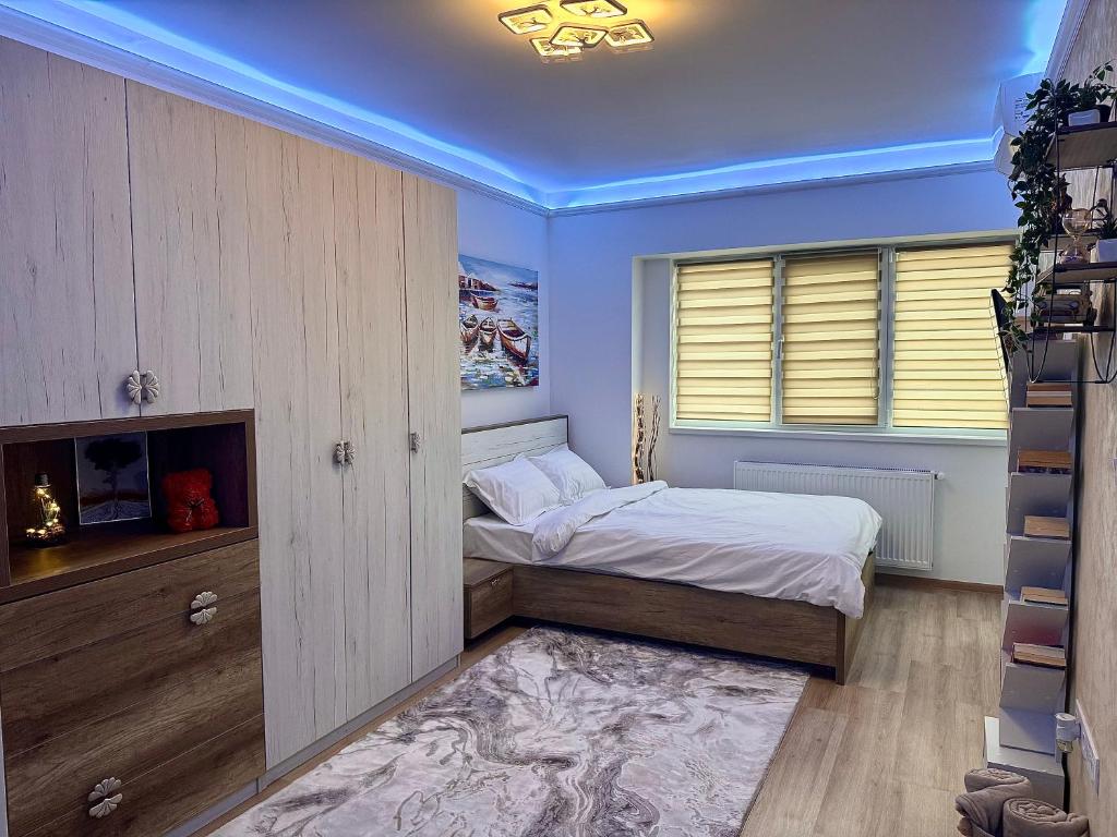 Postel nebo postele na pokoji v ubytování Home away from home - Cozy and Spacious Studio with Balcony