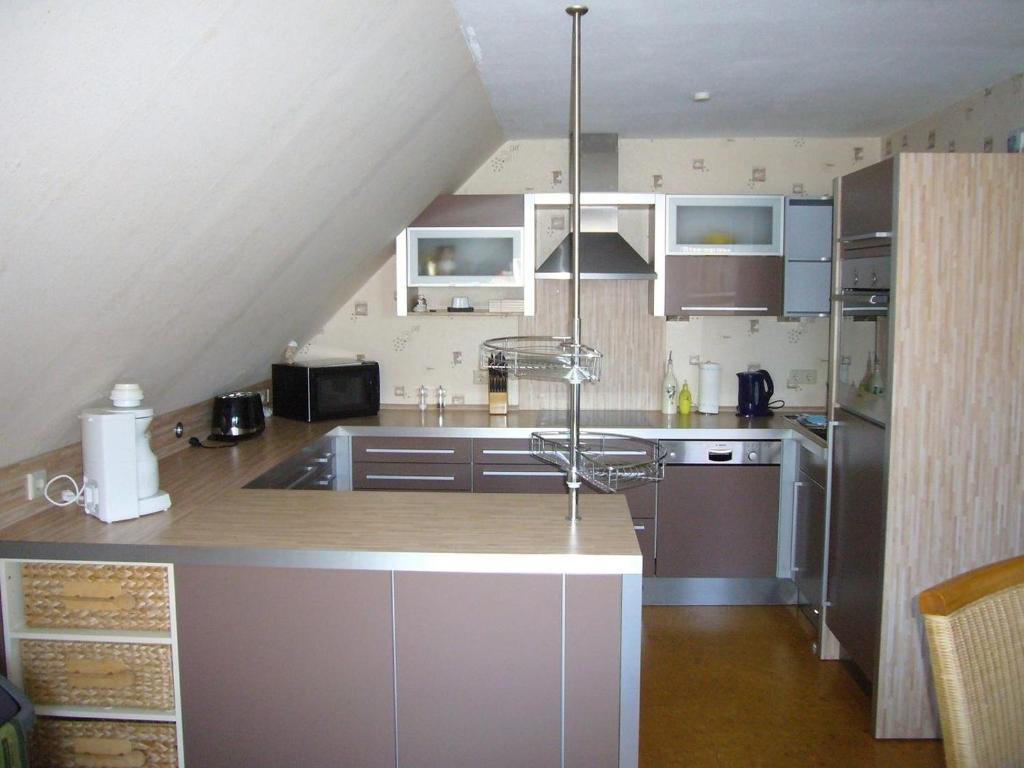 Köök või kööginurk majutusasutuses Seehund