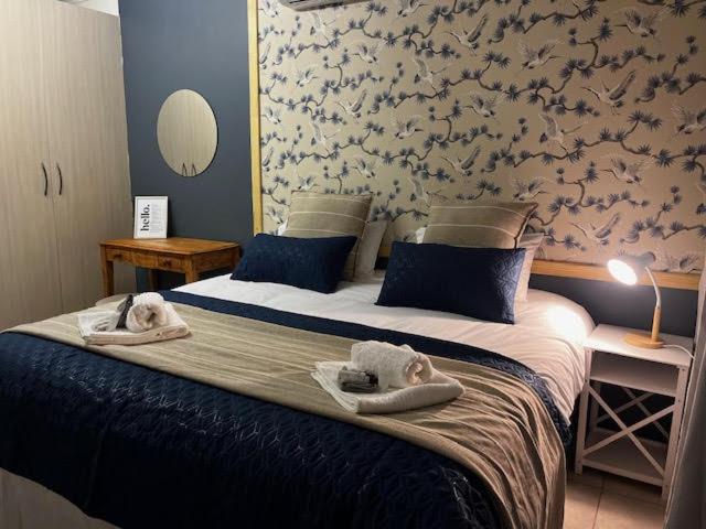 Postel nebo postele na pokoji v ubytování Compass Overnight Langenhovenpark