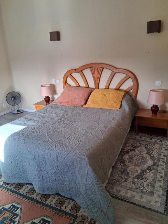 Ένα ή περισσότερα κρεβάτια σε δωμάτιο στο chambre dans maison de Maitre