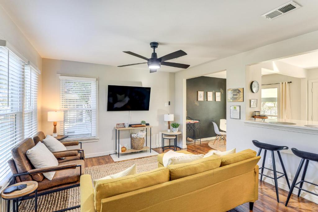 a living room with a couch and a tv at 2 Blocks to ATandT Stadium World Cup Location in Arlington