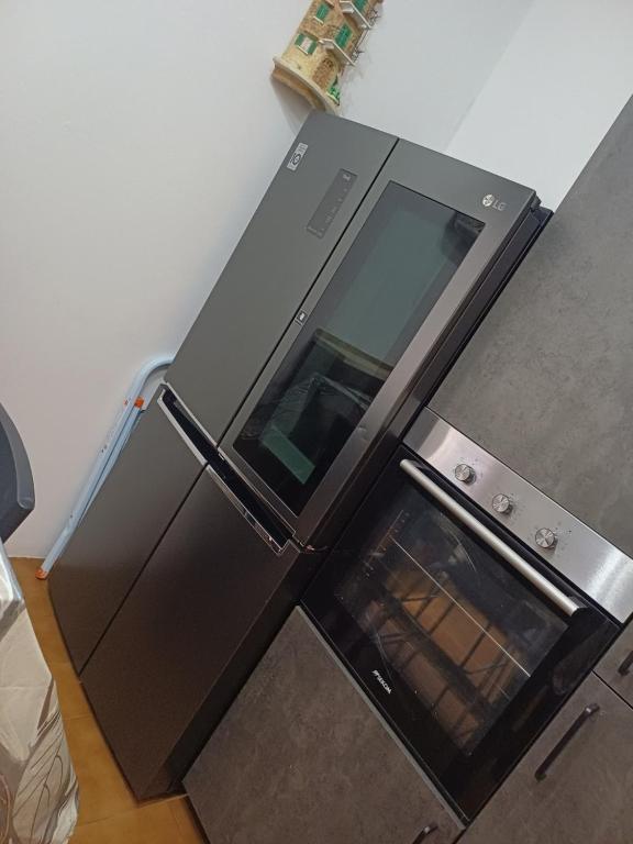 Kuchyň nebo kuchyňský kout v ubytování B&B Giovanni e Rosy