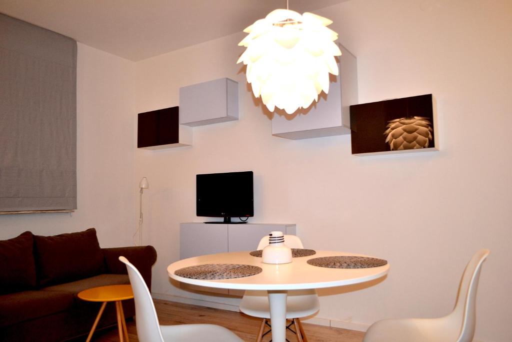 Televízia a/alebo spoločenská miestnosť v ubytovaní Studio Praga