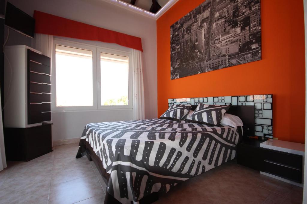 Postel nebo postele na pokoji v ubytování Villa Chayofa Sunrises