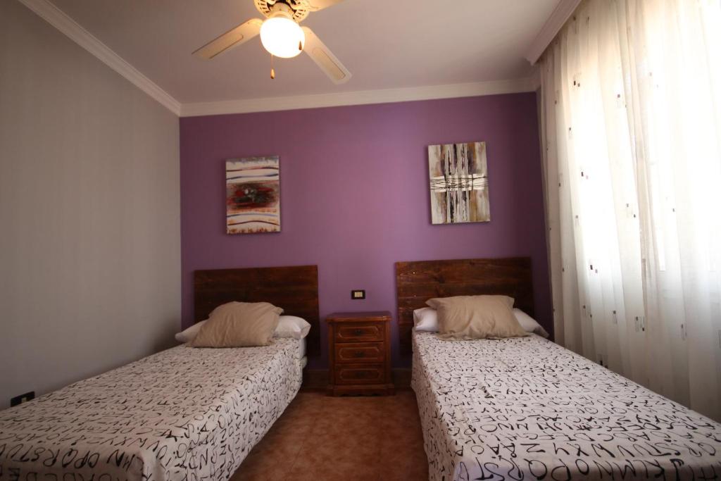 Postel nebo postele na pokoji v ubytování Villa Chayofa Sunrises
