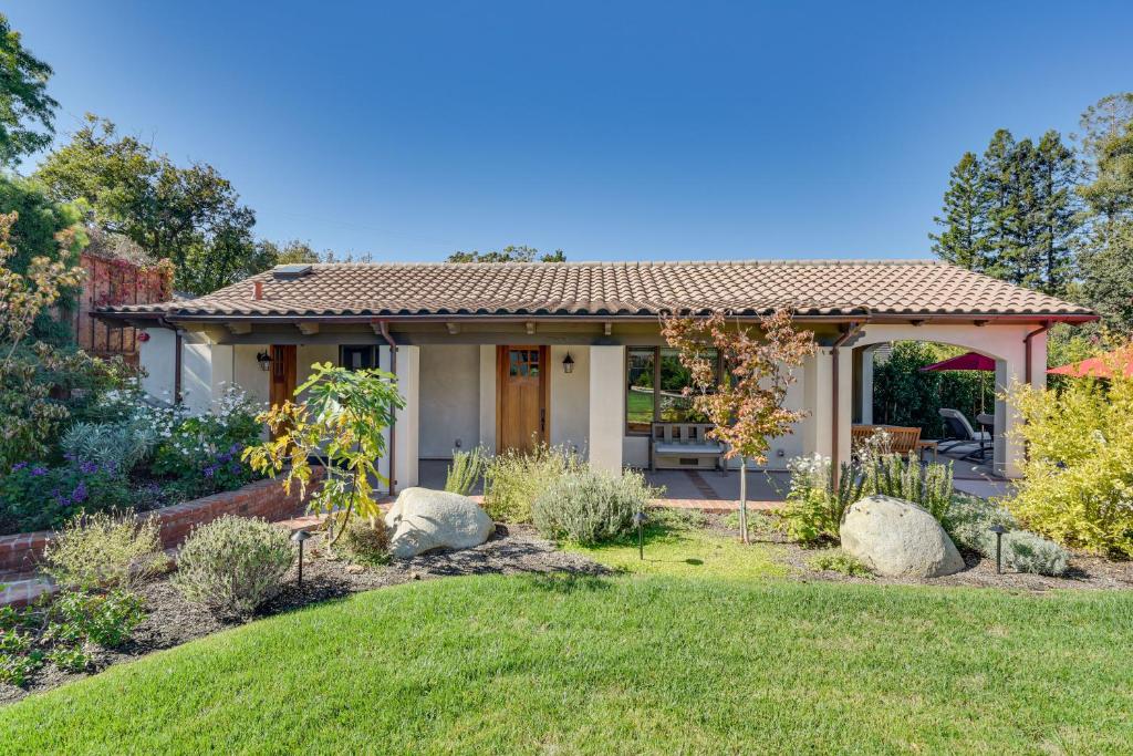 a home with a garden and a house at Los Gatos Guest Cottage: 2 Mi to Netflix HQ! in Monte Sereno