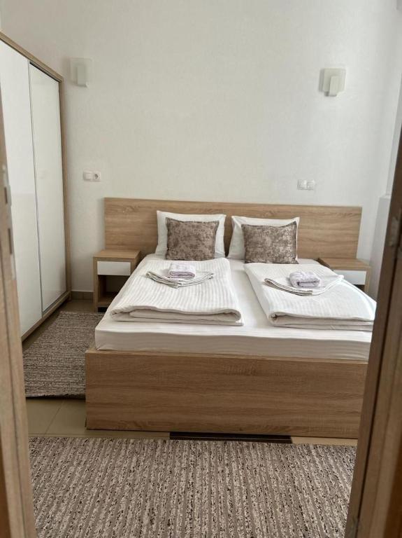 Ένα ή περισσότερα κρεβάτια σε δωμάτιο στο Hotel Aldi