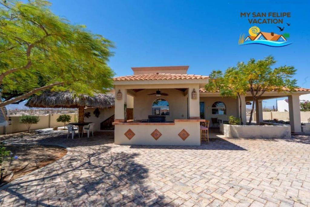 a home in the desert with a pavilion at Mountain side Delight - Palapas house San Felipe Vacation Rental in San Felipe