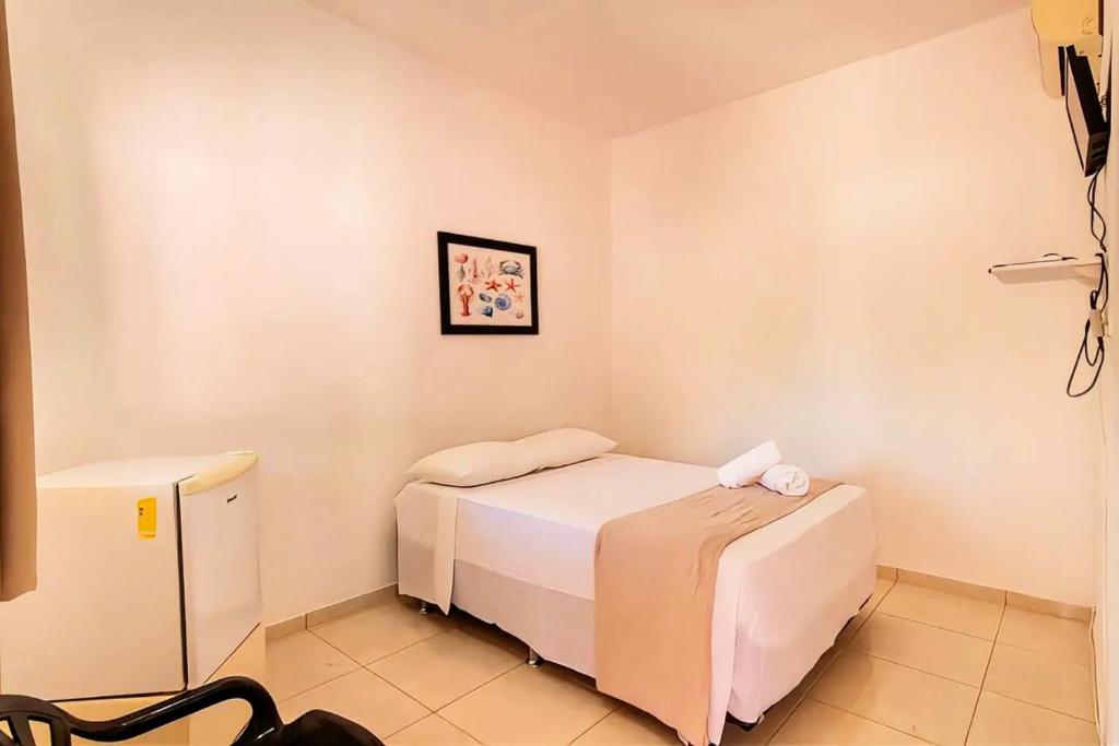 Postel nebo postele na pokoji v ubytování Fonte dos Corais - Suíte Pé na Areia