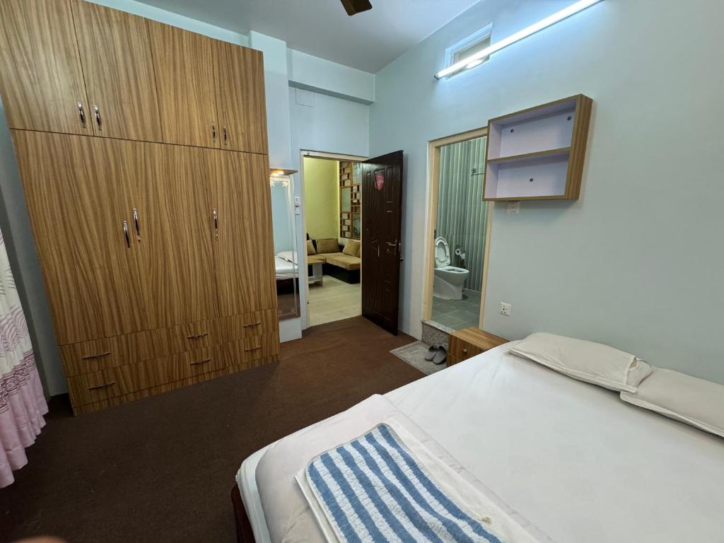 Postel nebo postele na pokoji v ubytování H&S Apartment