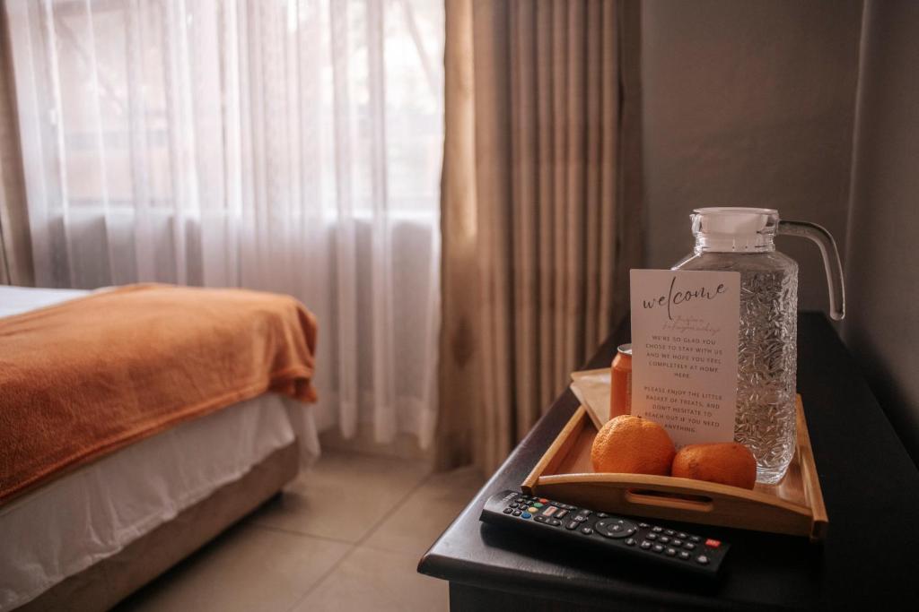 Postel nebo postele na pokoji v ubytování Nate's Nest by The Pause