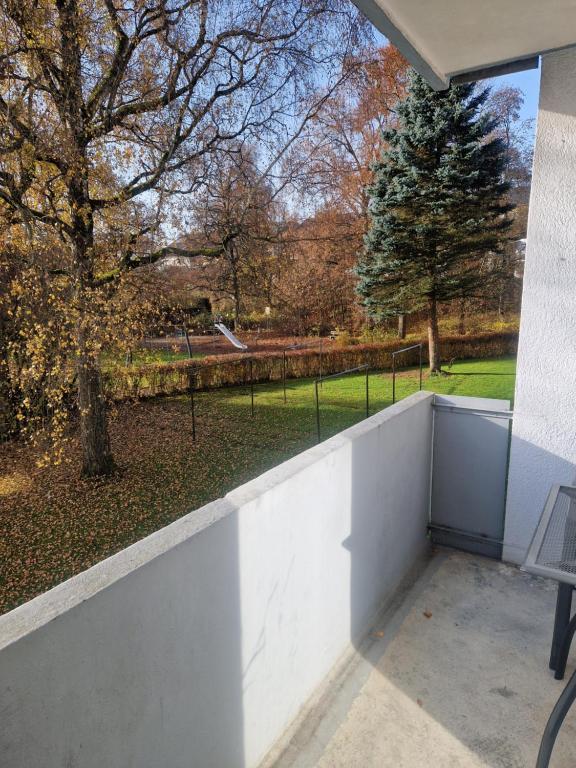 a balcony with a view of a park at Ferienwohnung Biberach an der Riß in Biberach an der Riß