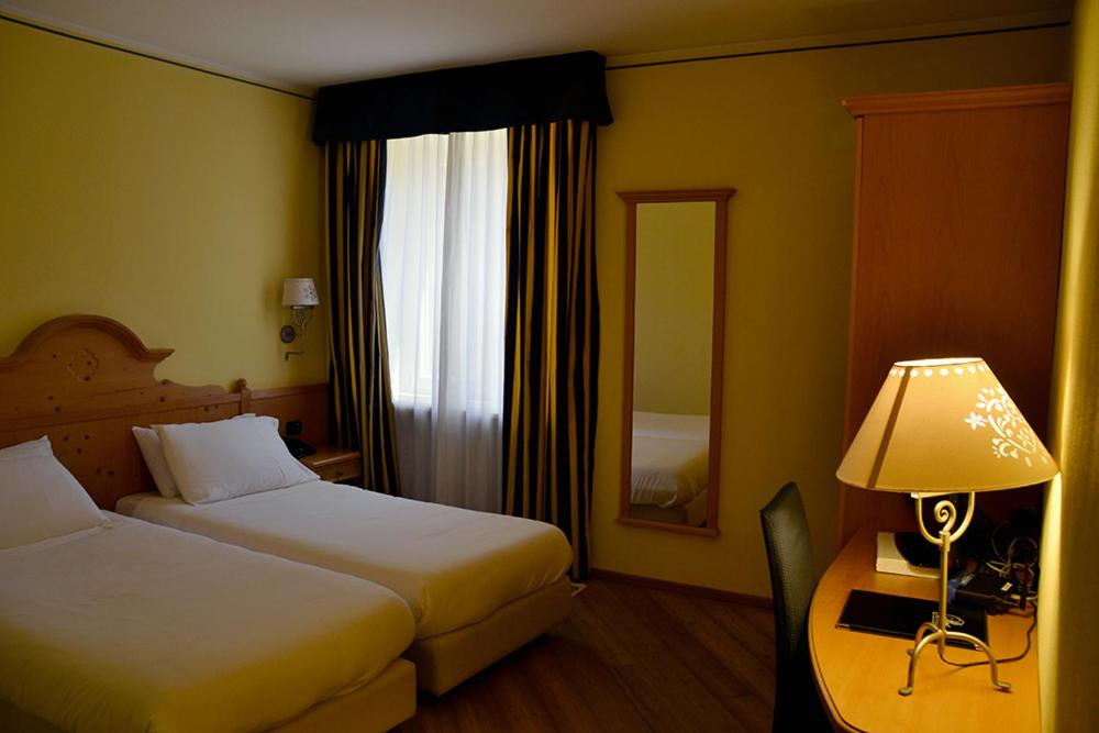 Postel nebo postele na pokoji v ubytování Hotel Bes & Spa