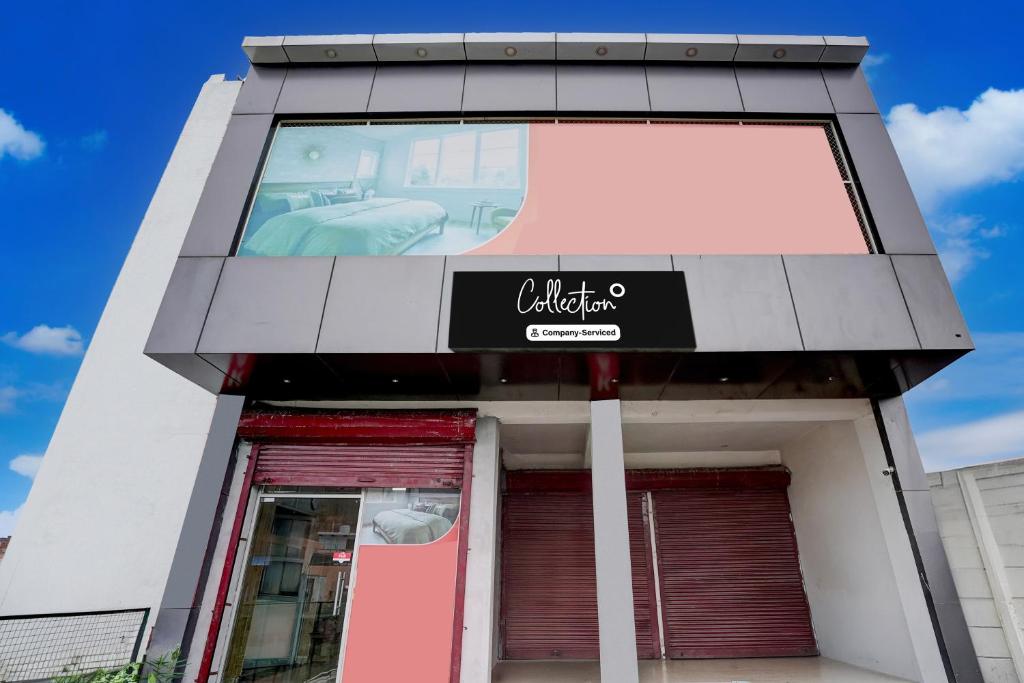 a building with a sign on the front of it at Collection O Palwal-Aligarh Crossway Formerly Hotel Kadamb in Palwal