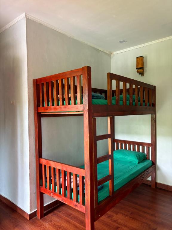 Postel nebo postele na pokoji v ubytování Asim Paris Guesthouse & jungle trekking