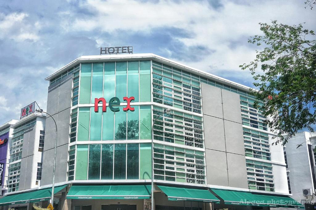 a large building with a fedex sign on it at Nex Hotel Johor Bahru in Johor Bahru