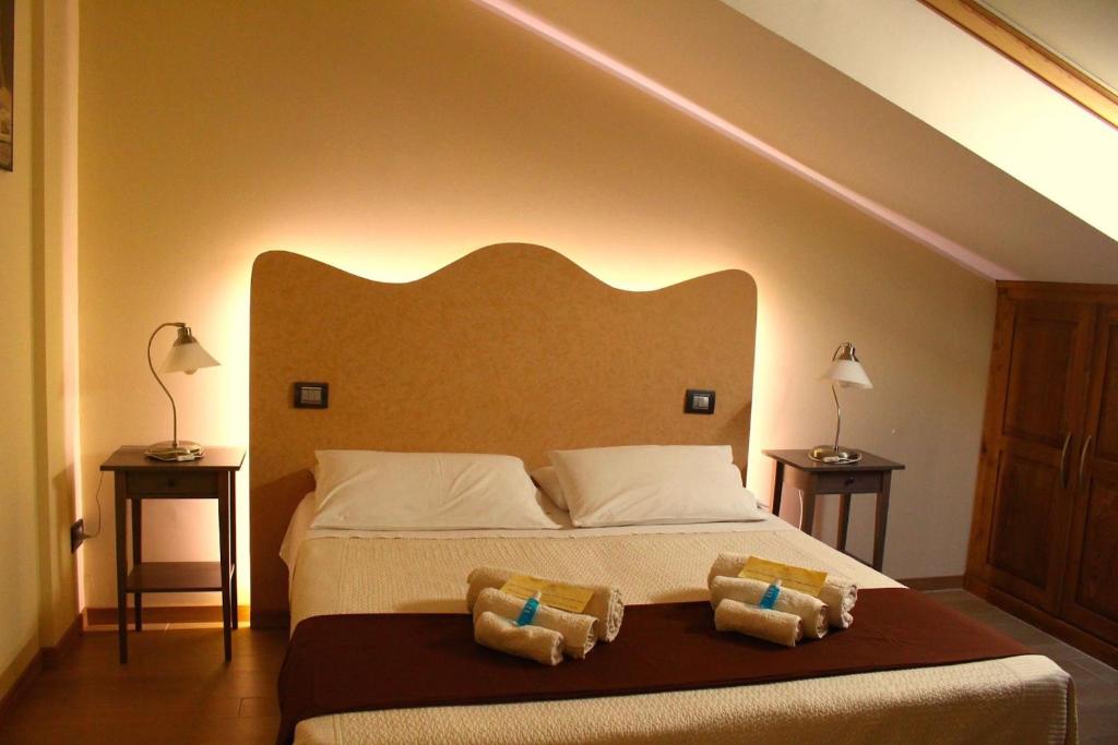 Postel nebo postele na pokoji v ubytování B&B Eremes