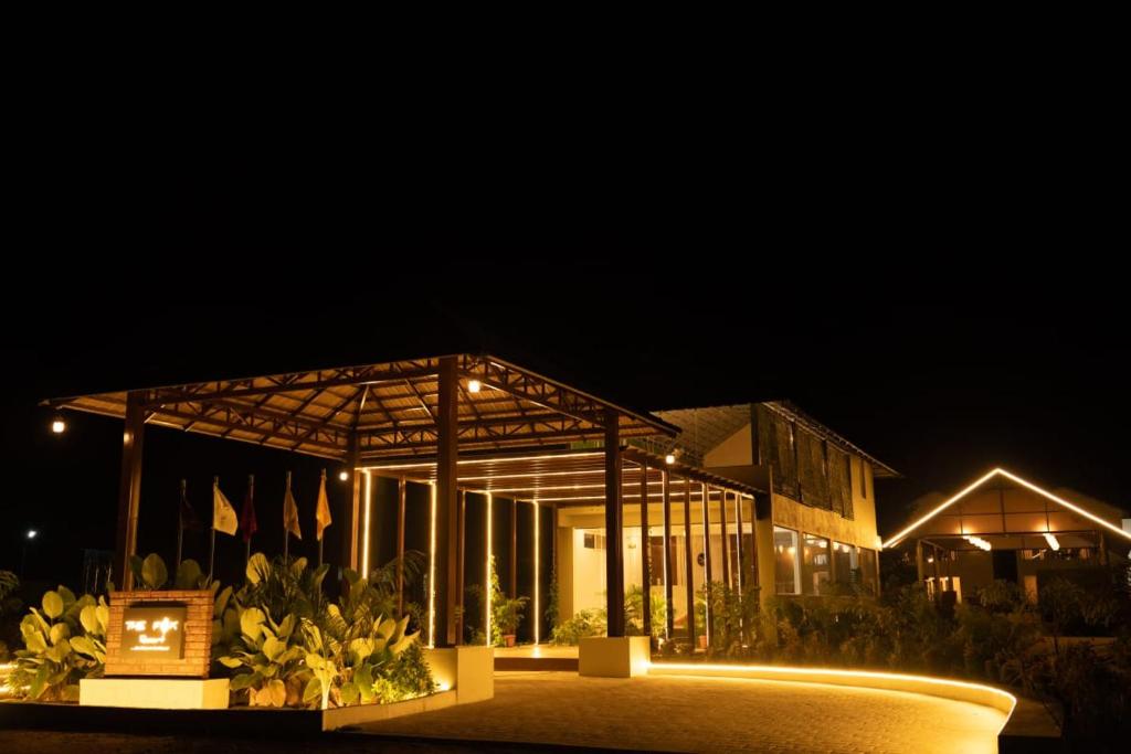 a building at night with lights on it at The Fox Resort, Bandipur in Bandipūr