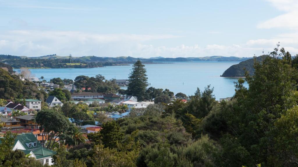 a view of a town and a body of water at Allure Lodge in Paihia
