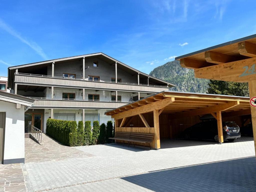 a large building with a parking lot in front of it at Aparmán Tester 22 in Olsztyn