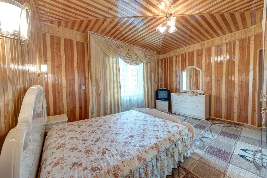 Postel nebo postele na pokoji v ubytování Guest House Velet