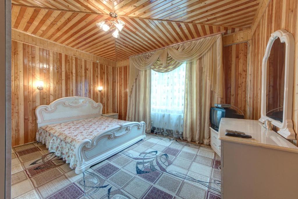 Postel nebo postele na pokoji v ubytování Guest House Velet