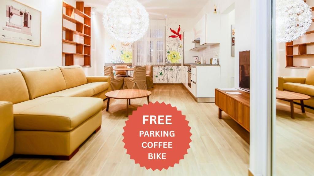 a living room with a couch and a table at WH Apartments in Ljubljana