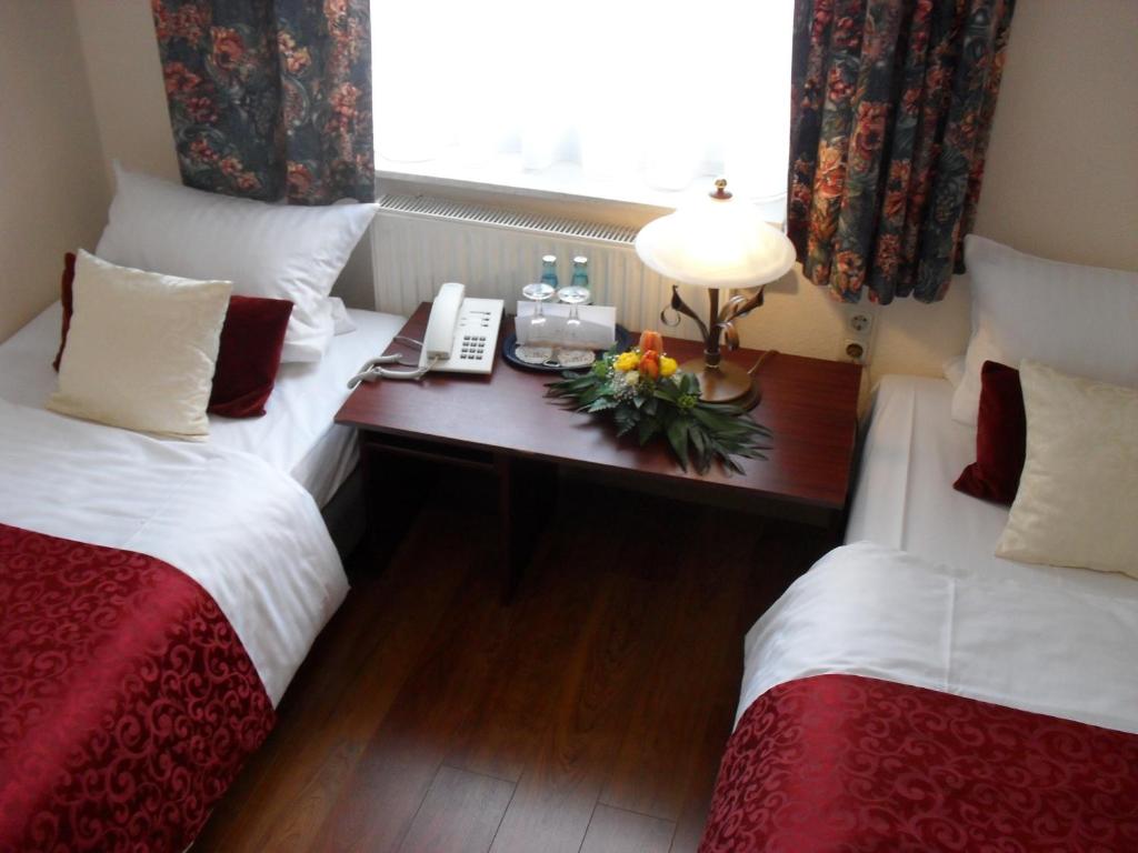 Letto o letti in una camera di In Piazza