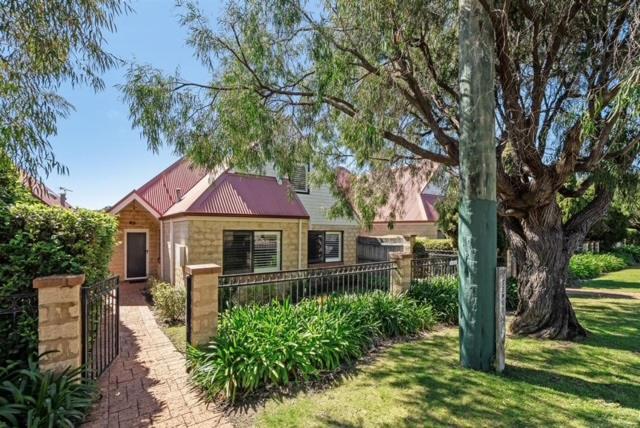a house with a fence in a yard at Clearwater Escape Dunsborough in Dunsborough