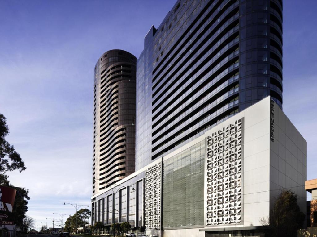 a tall building with a lot of windows at Art Series - The Chen in Box Hill