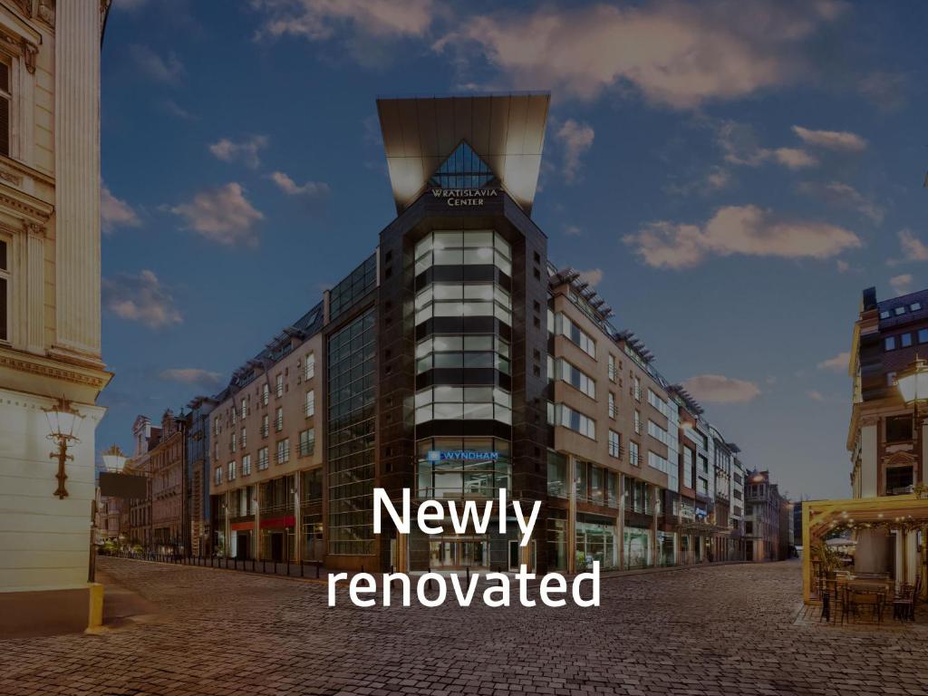 a view of a building with the words newly renovated at Wyndham Wroclaw Old Town in Wrocław