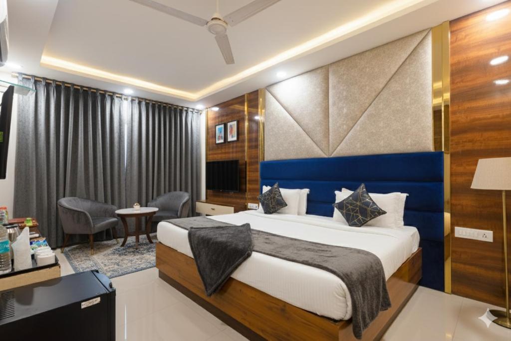 Ένα ή περισσότερα κρεβάτια σε δωμάτιο στο Hotel Caves Premium Near Delhi Airport