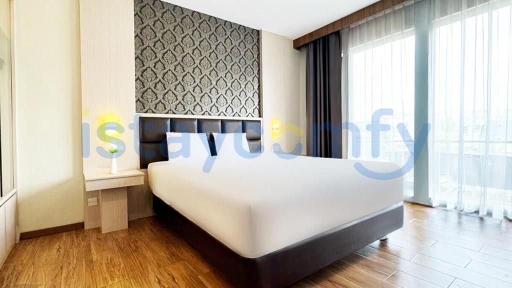 Ένα ή περισσότερα κρεβάτια σε δωμάτιο στο Studio Aston Residence 0206 City View